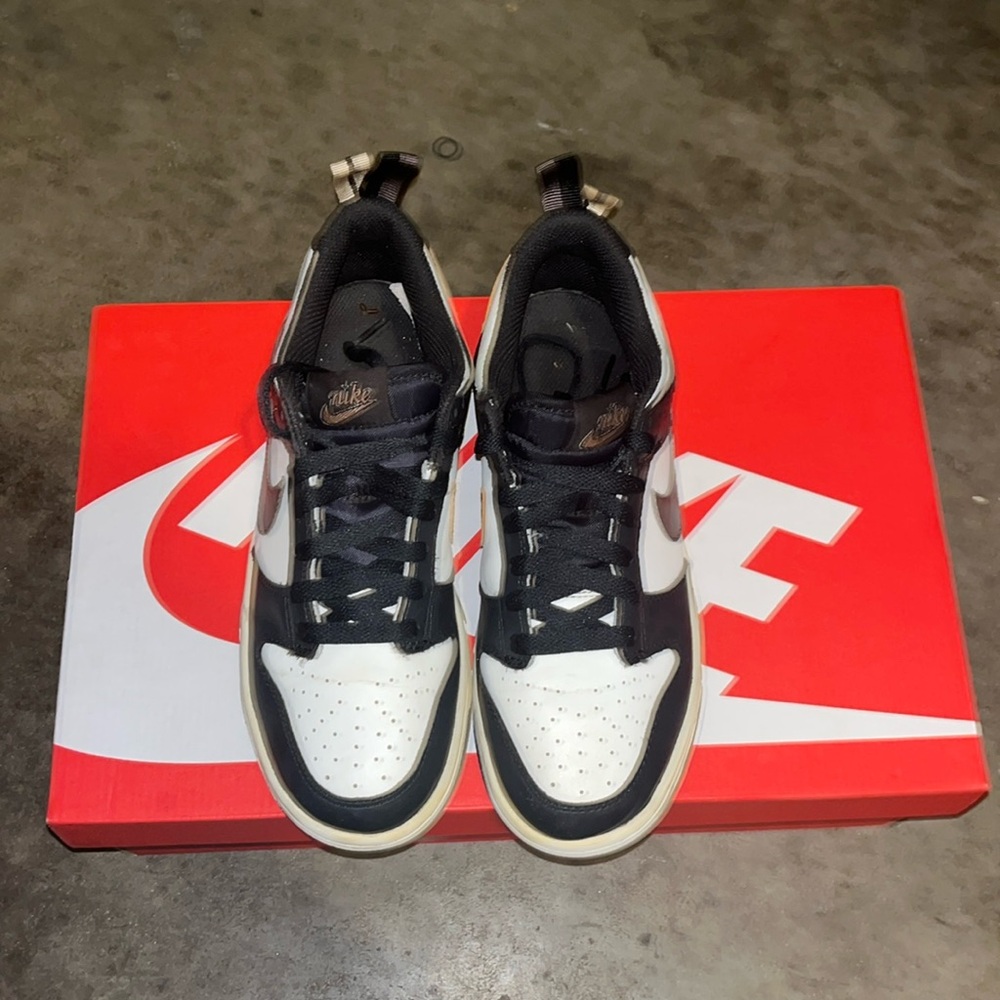 Nike Dunks Black and White Shoes with Gold Highlights